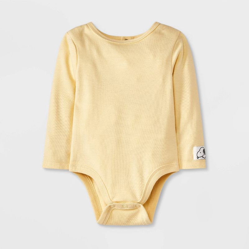 slide 3 of 4, Baby Boys' Peanuts Snoopy 2pc Long Sleeve Bodysuit and Quilted Overalls Set - Yellow/Beige 18M, 2 ct