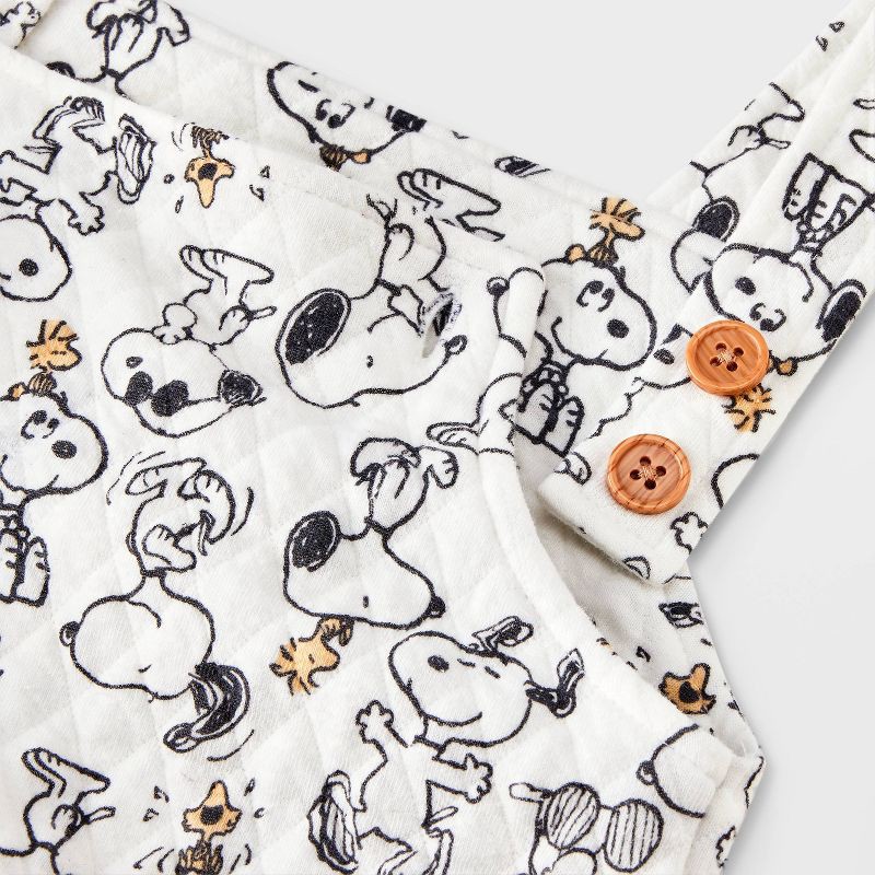 slide 4 of 4, Baby Boys' Peanuts Snoopy 2pc Long Sleeve Bodysuit and Quilted Overalls Set - Yellow/Beige 18M, 2 ct