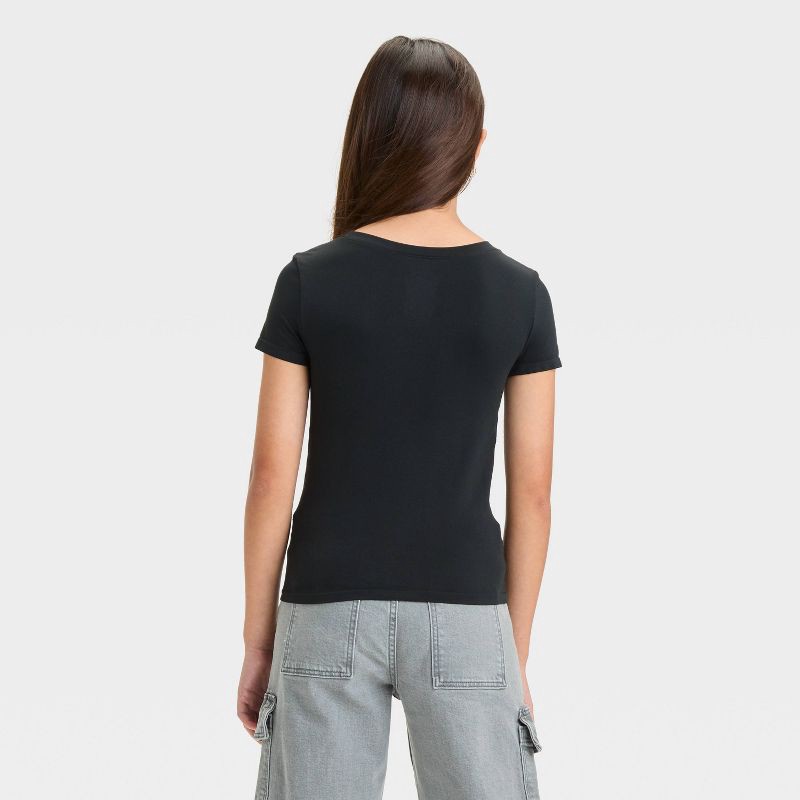 slide 2 of 3, Girls' Short Sleeve Roundneck T-Shirt - art class™ Black XL: Fitted Pullover, Seamless Scuba Fabric, 1 ct