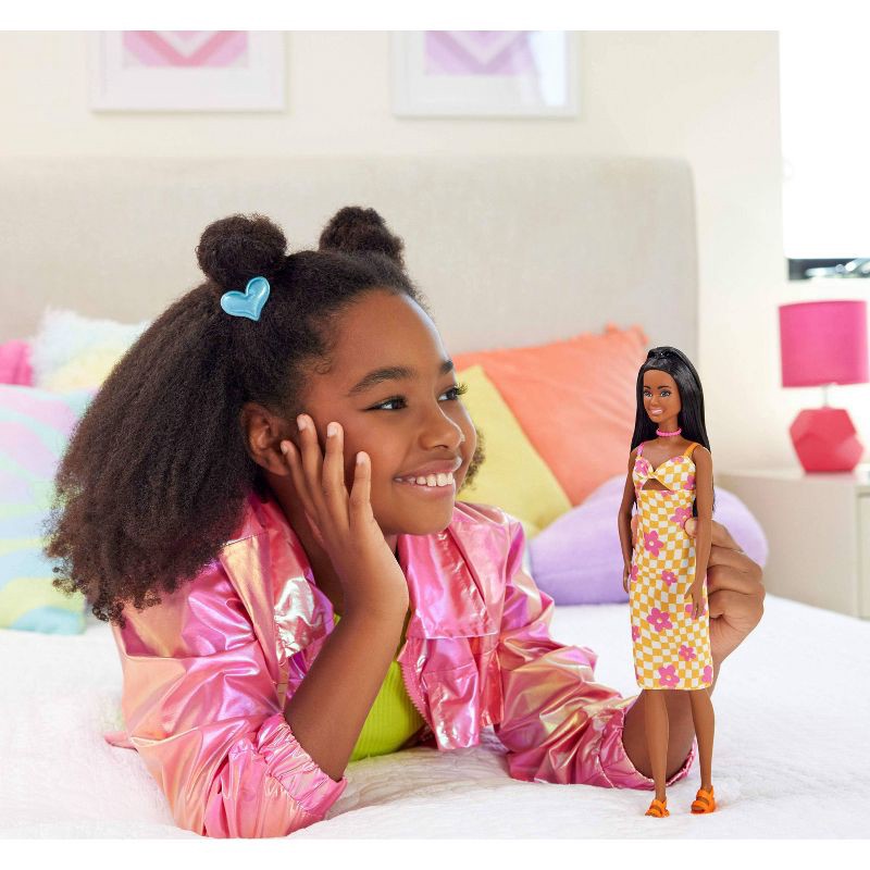 slide 2 of 6, Barbie 12.7" Fashionista Pink and Orange Check Dress Doll Black Hair/Brown Eyes, 1 ct