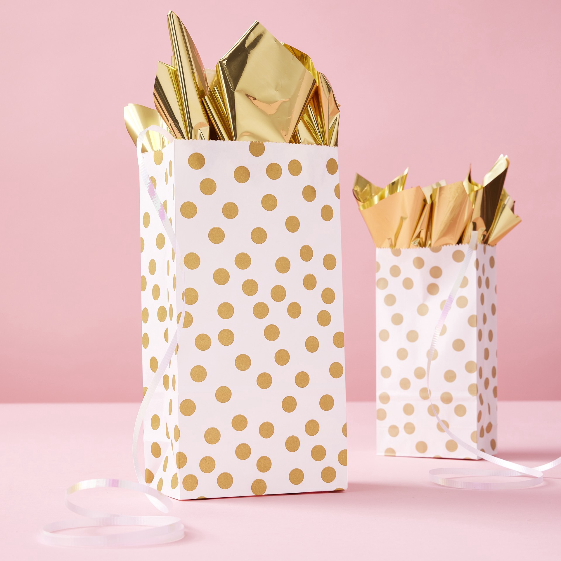 slide 3 of 3, 5" X 9" White & Gold Dotted Treat Bags By Celebrate It, 5 in x 9 in