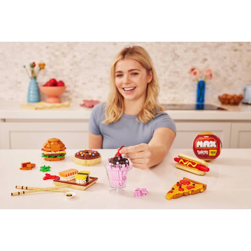 slide 11 of 13, MAX Build More Snacks Series 1 Capsule, 1 capsule