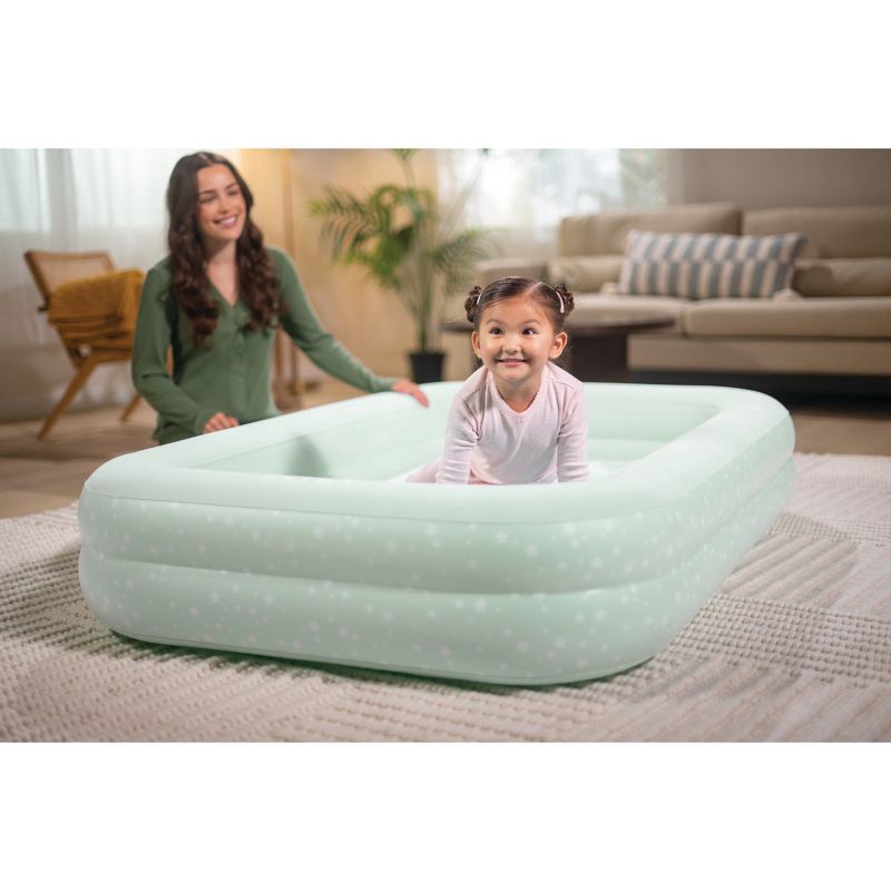 slide 2 of 9, Intex Kids' 10" Toddler Travel Manual Pump Air Mattress - Light Mint Green: Inflatable Bed for Indoor/Outdoor Use, 1 ct