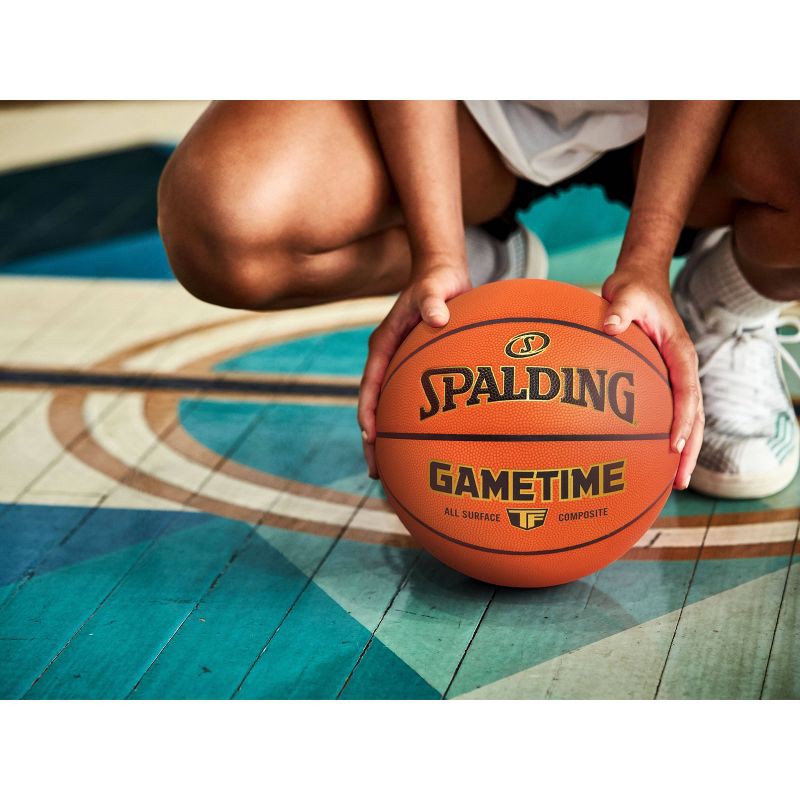 slide 2 of 3, Spalding Gametime 29.5" Basketball: Official Size 7, Indoor-Outdoor Use, Composite Material, 1 ct