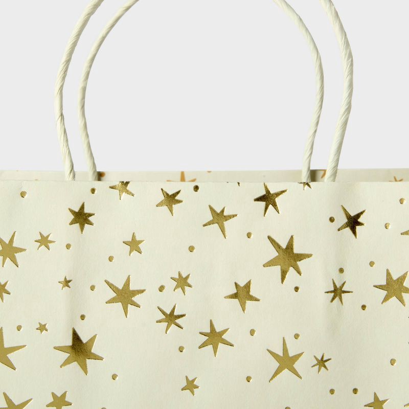slide 3 of 3, XXL Foil Print Stars Gift Bag Cream/Gold - Spritz™, 1 ct