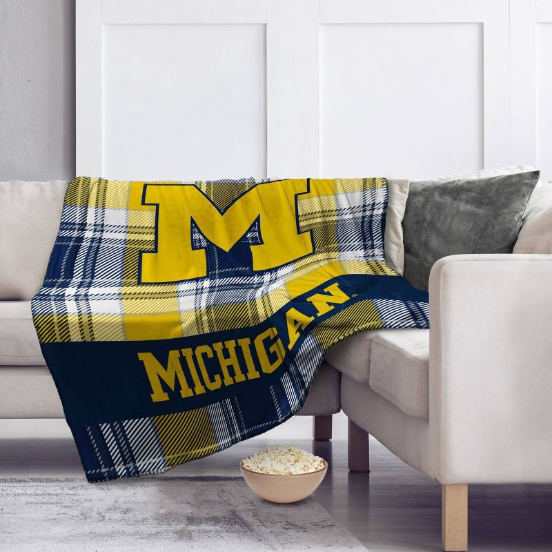 slide 2 of 3, NCAA Michigan Wolverines Plaid Ultra Cozy Throw Blanket, 1 ct