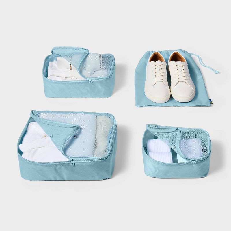 slide 2 of 3, 4pc Packing Cube Set - Open Story™ Muddy Aqua: Zipper & Drawstring Closure, 4 ct