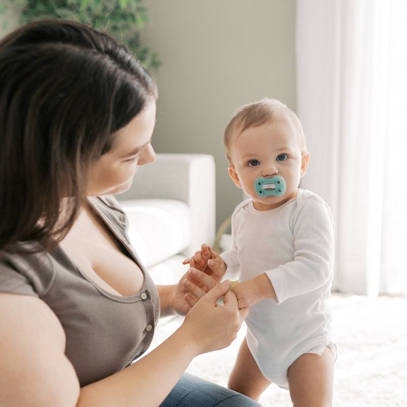 slide 13 of 15, Dr. Brown's Advantage One-Piece Lightweight Silicone Pacifier Stage Two, with one Glow-in-the-Dark Pacifier - 3pk, 3 ct