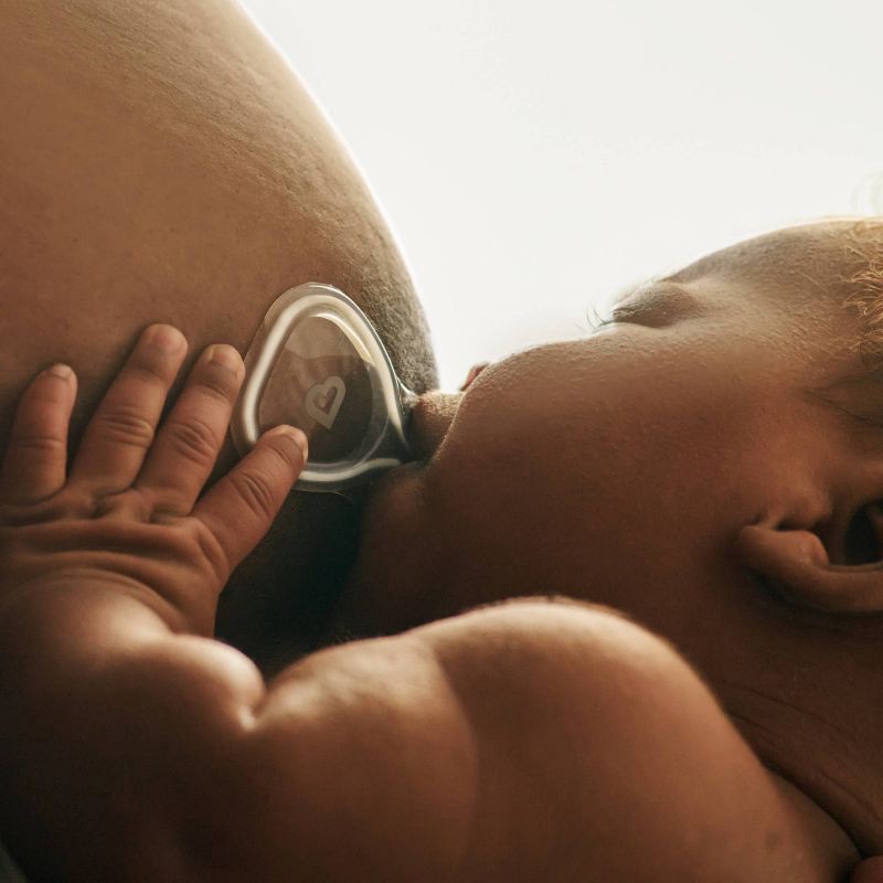 slide 2 of 10, Munchkin Flow Nipple Shield + With See-Thru Channel to Watch Milk Flow 24mm, 1 ct