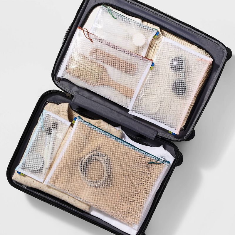 slide 3 of 3, 5pc Clear Toiletry Set - Open Story™️: Travel Cosmetic Storage Pouches, 5 ct