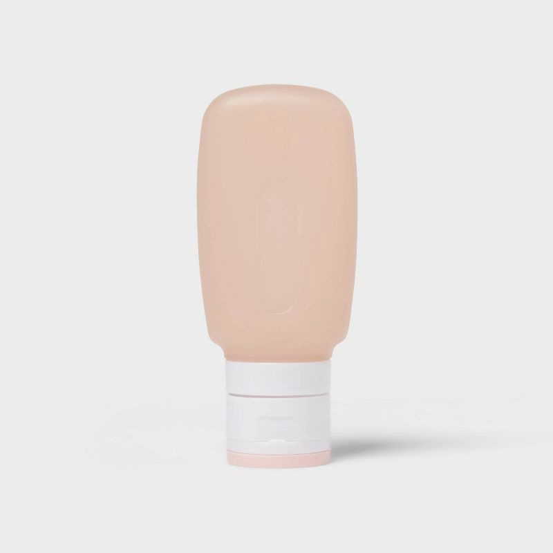 slide 1 of 4, Silicone Squeeze Bottle - 3oz - Pink - up&up™: Canister Lid, Solid Pattern, Travel Toiletry Container, 3 oz