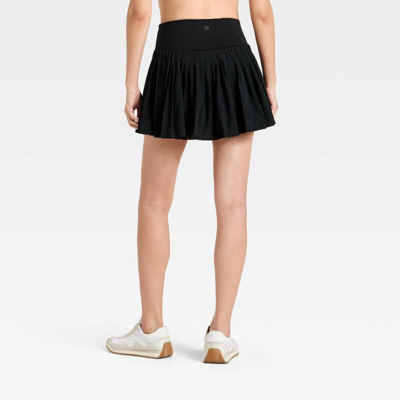 slide 2 of 8, Women's High-Rise Woven Pleated Skort 15.75" - All In Motion™ Black M: Moisture Wicking, Quick Dry, UPF 50+, Built-in Shorts, 1 ct