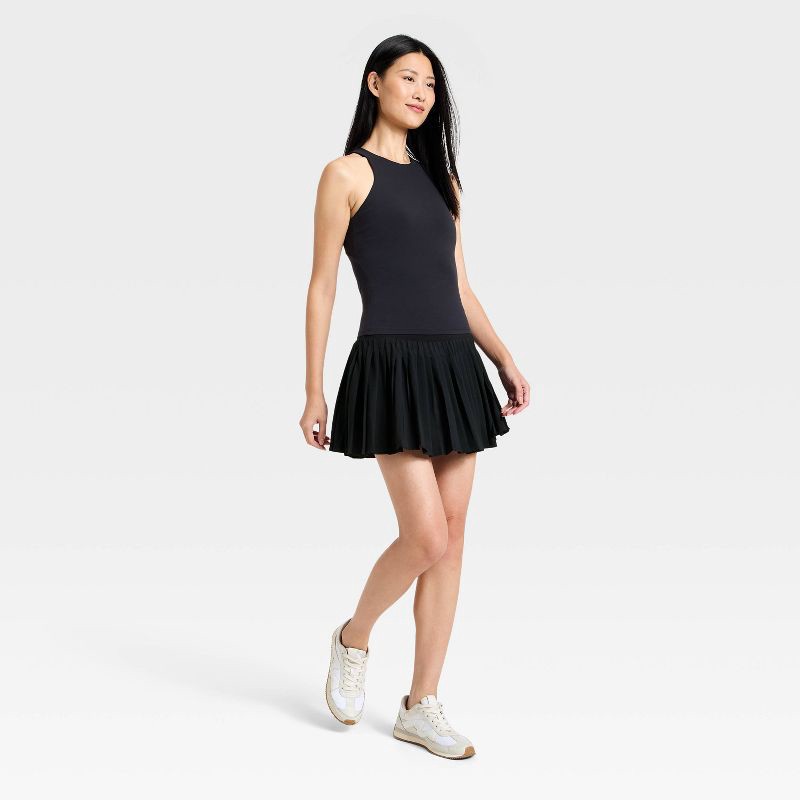 slide 3 of 8, Women's High-Rise Woven Pleated Skort 15.75" - All In Motion™ Black M: Moisture Wicking, Quick Dry, UPF 50+, Built-in Shorts, 1 ct