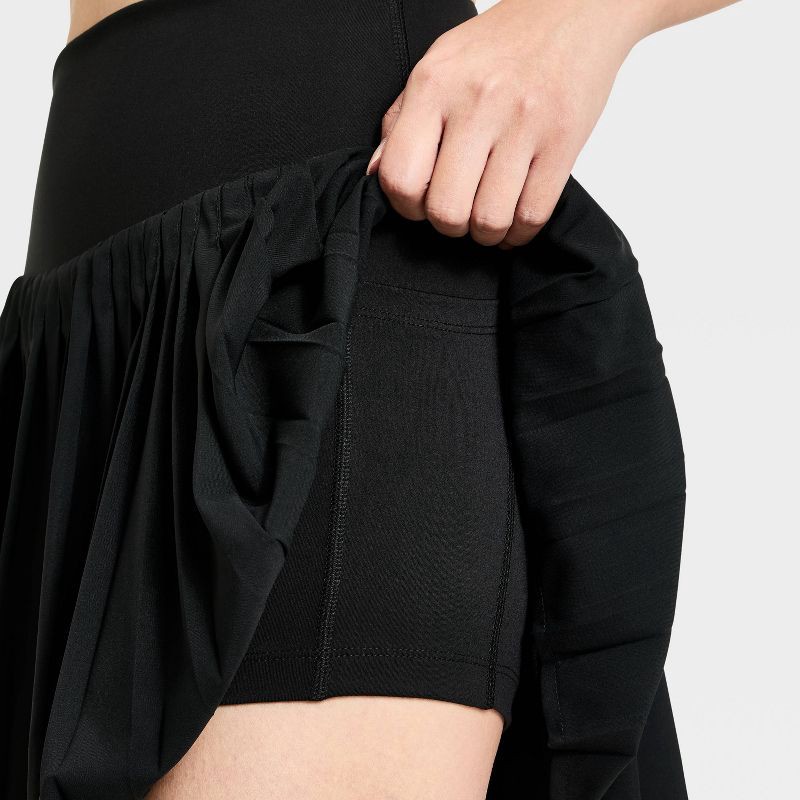 slide 6 of 8, Women's High-Rise Woven Pleated Skort 15.75" - All In Motion™ Black M: Moisture Wicking, Quick Dry, UPF 50+, Built-in Shorts, 1 ct