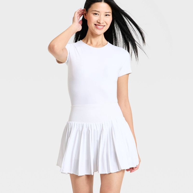 slide 3 of 8, Women's High-Rise Woven Pleated Skort 15.75" - All In Motion™ White XS: Moisture Wicking, Quick Dry, Built-in Shorts, UPF 50+, 1 ct