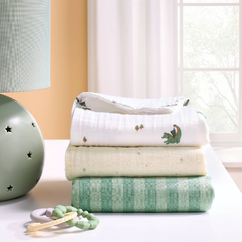 slide 2 of 4, Muslin Swaddle Baby Blanket - Dragons - 3pk - Cloud Island™, 3 ct