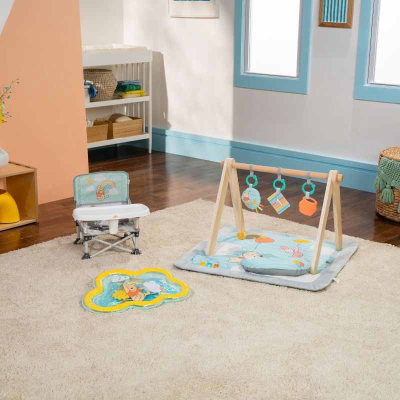 slide 7 of 15, Bright Starts Disney Winnie the Pooh Once Upon a Tummy Time Water Mat - Blue, 1 ct