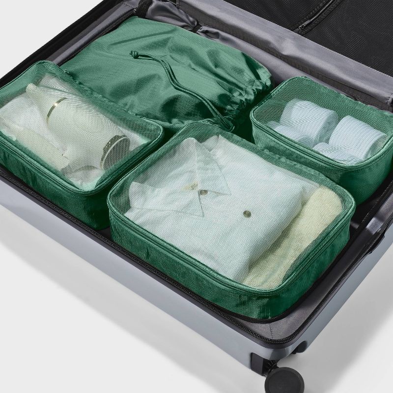 slide 3 of 3, 4pc Packing Cube Set - Open Story™ Green: Travel Luggage Accessories, Zipper Closure, 4 ct
