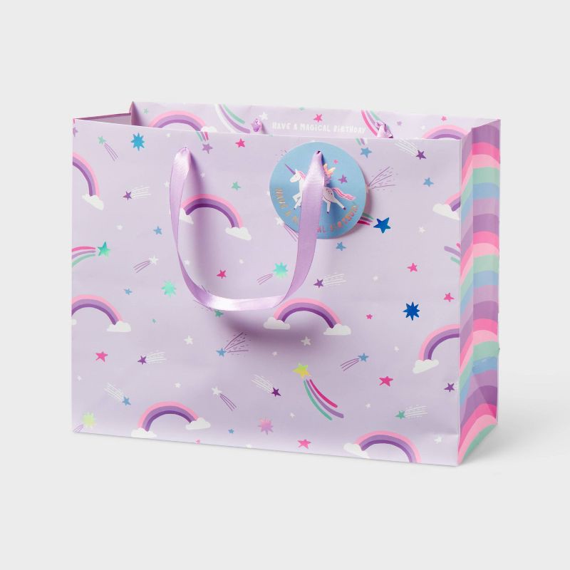 slide 1 of 3, Large Unicorn Rainbow Birthday Gift Bag with Tag Purple - Spritz™, 1 ct