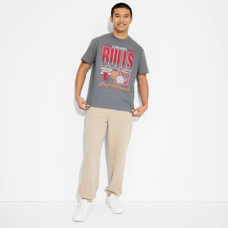 slide 1 of 3, Men's Short Sleeve Chicago Bulls Graphic T-Shirt - Original Use™ Dark Gray L, 1 ct