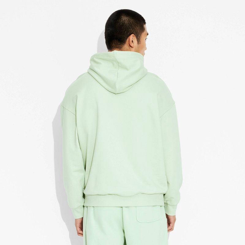 slide 3 of 3, Men's Oversized Fit Hooded Pullover Sweatshirt - Original Use™ Light Green L: Midweight French Terry, Kangaroo Pocket, 1 ct