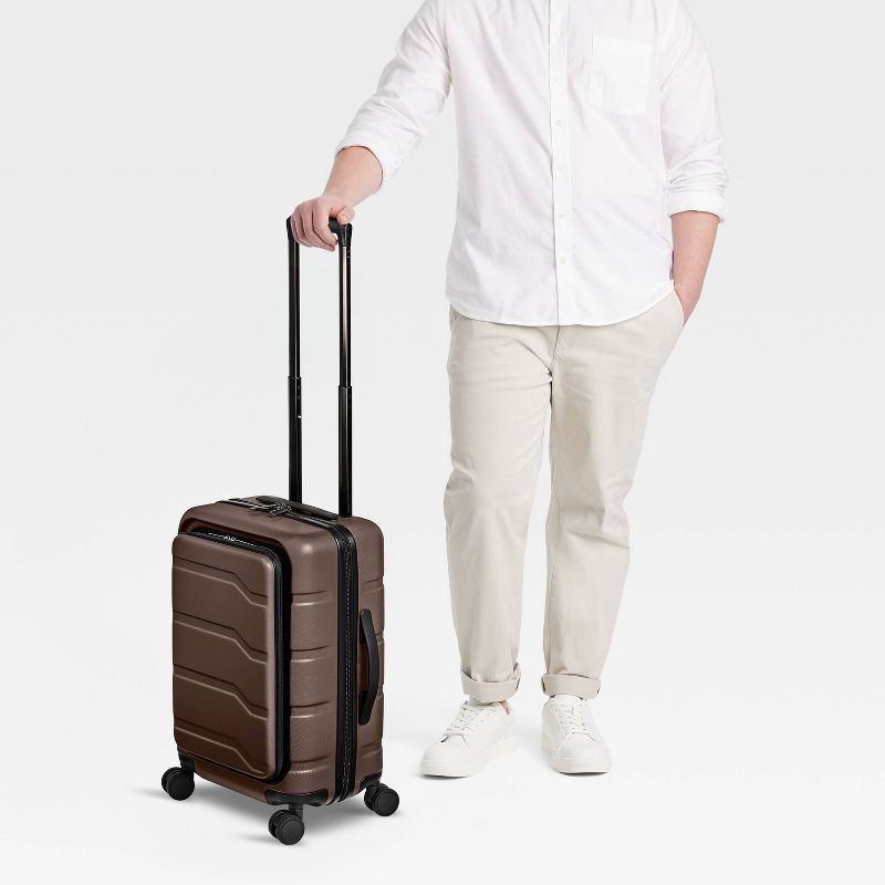 slide 2 of 7, Hardside Carry On Spinner Suitcase with Front Pocket - Open Story™ Chocolate: Water-Resistant Luggage, 1 ct