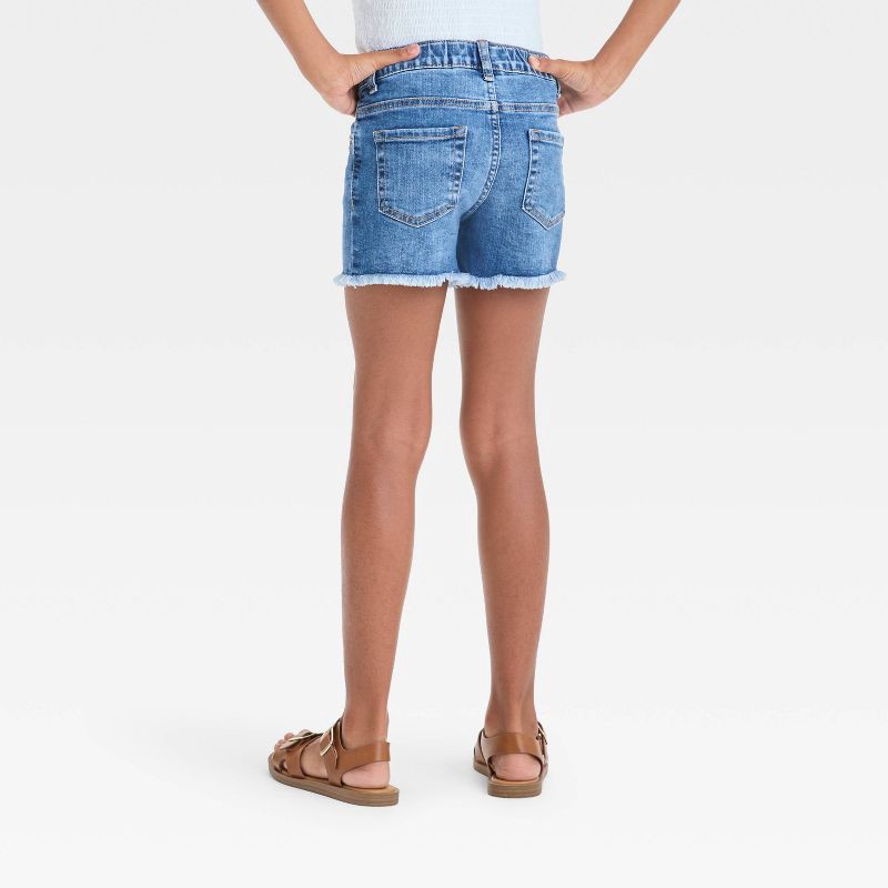 slide 2 of 3, Girls' Cutoff Mid-Rise Jean Shorts - Cat & Jack™ Medium Wash XS: Adjustable Waistband, Stretch Denim, 2.5" Inseam, 1 ct