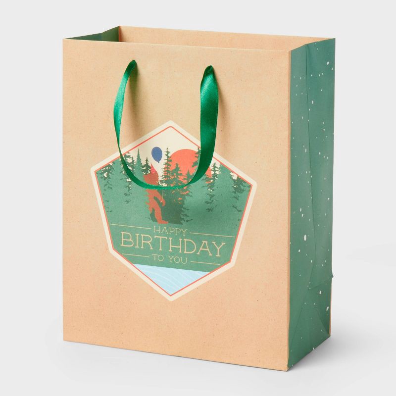 slide 1 of 3, Small 'Happy Birthday' Big Foot Badge Birthday Gift Bag Natural - Spritz™, 1 ct
