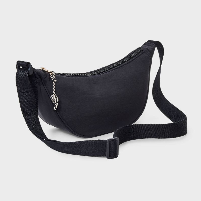 slide 3 of 5, Essential Crescent Sling Crossbody Bag - Universal Thread™ Black: Adjustable Strap, Recycled Nylon, Lightweight Design, 1 ct
