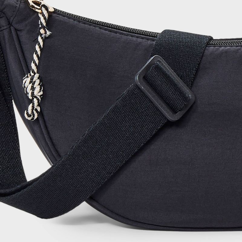 slide 5 of 5, Essential Crescent Sling Crossbody Bag - Universal Thread™ Black: Adjustable Strap, Recycled Nylon, Lightweight Design, 1 ct