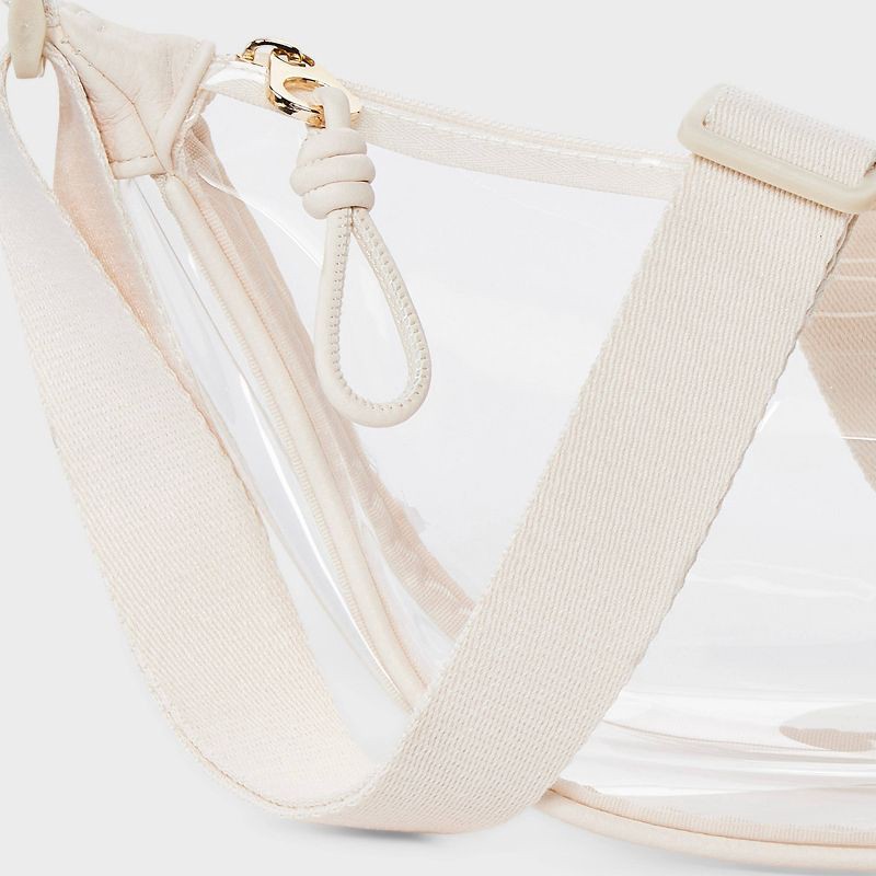 slide 5 of 5, Essential Crescent Sling Crossbody Bag - Universal Thread™ Clear/Cream: Adjustable Strap, Lightweight TPU, 1 ct