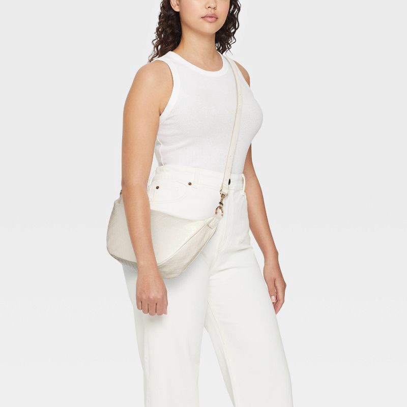 slide 2 of 5, Essential Sling Crossbody Bag - Universal Thread™ Off-White: Detachable Strap, 45.5" Max Length, 1 ct