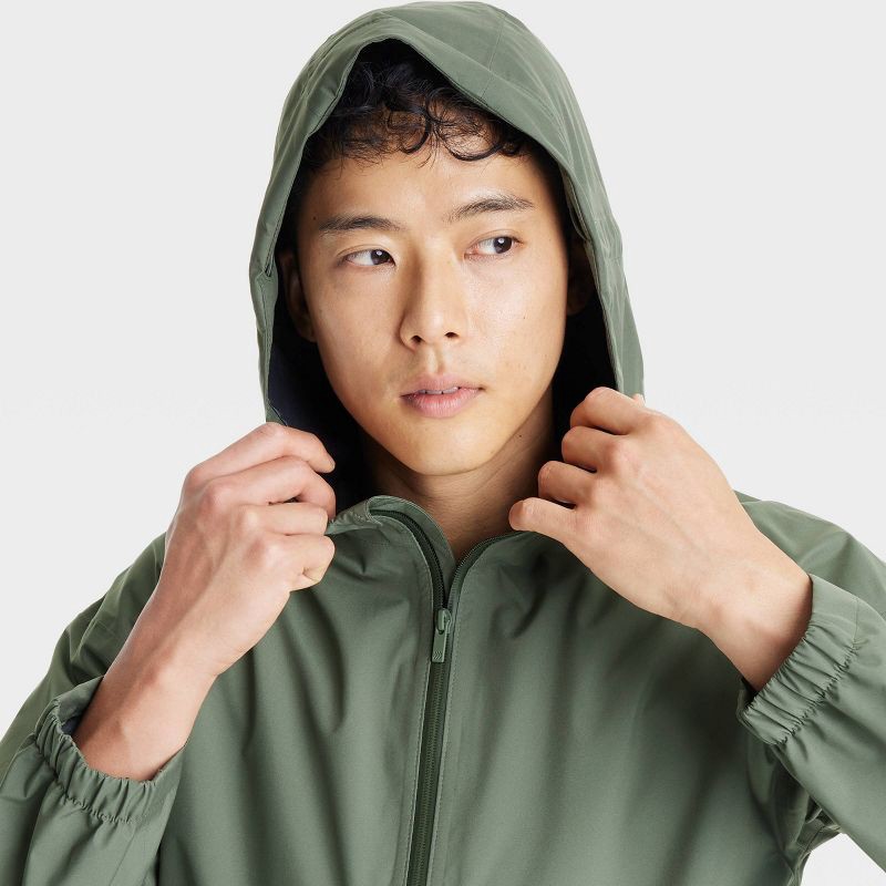 slide 3 of 3, Men's Waterproof Rain Coat - All In Motion™ Dark Olive Green XXL: Recycled Polyester, Lightweight, Adjustable Hood, 1 ct