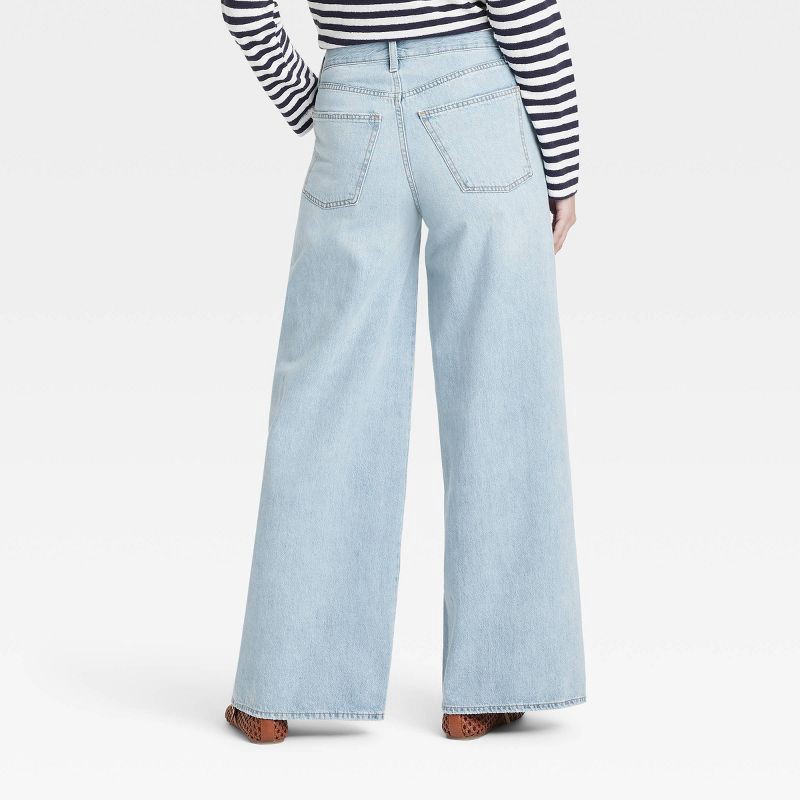 slide 2 of 3, Women's Mid-Rise Super Baggy Wide Leg Jeans - Universal Thread™ Light Wash 10: Relaxed Fit, Midweight Denim, 32" Inseam, 1 ct