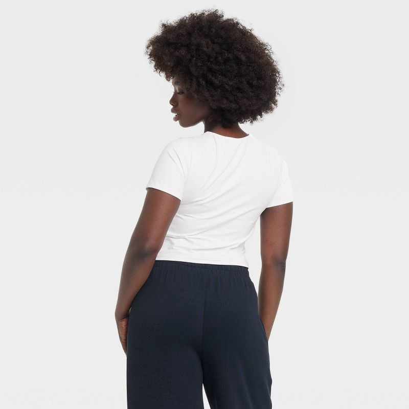slide 5 of 5, Women's Everyday Soft Cropped Short Sleeve T-Shirt - All In Motion™ White S: Moisture Wicking, UPF 50+, 1 ct