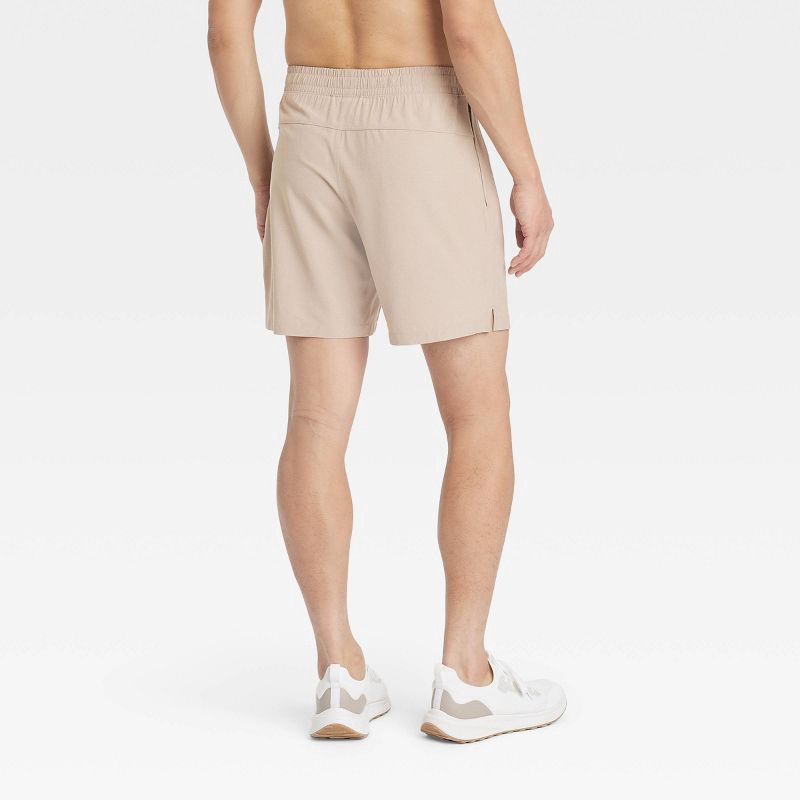 slide 2 of 3, Men's 8" Everyday Woven Shorts - All In Motion™ Tan M: Quick Dry, Moisture Wicking, Zippered Pocket, 1 ct