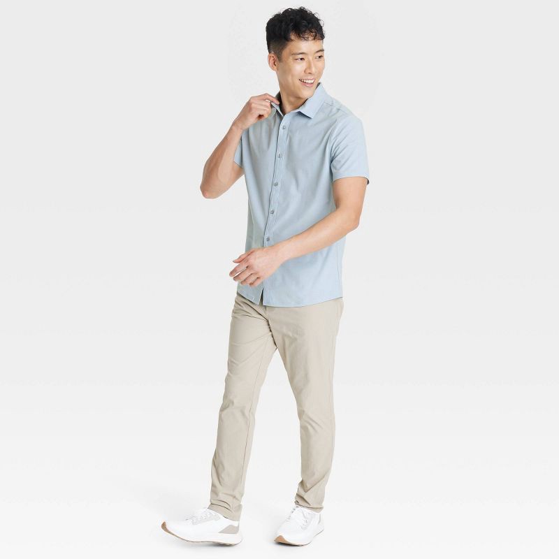 slide 3 of 3, Men's Short Sleeve Woven Shirt - All In Motion™ Light Blue L: Relaxed Fit, Quick Dry, Poplin Fabric, 1 ct