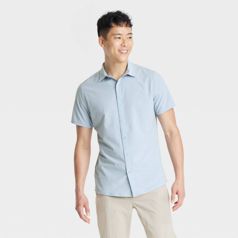 slide 1 of 3, Men's Short Sleeve Woven Shirt - All In Motion™ Light Blue L: Relaxed Fit, Quick Dry, Poplin Fabric, 1 ct