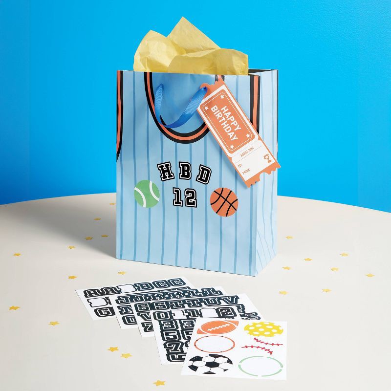 slide 2 of 3, Small Customizable Sports Jersey Birthday Gift Bag with Tag and Stickers Blue - Spritz™, 1 ct
