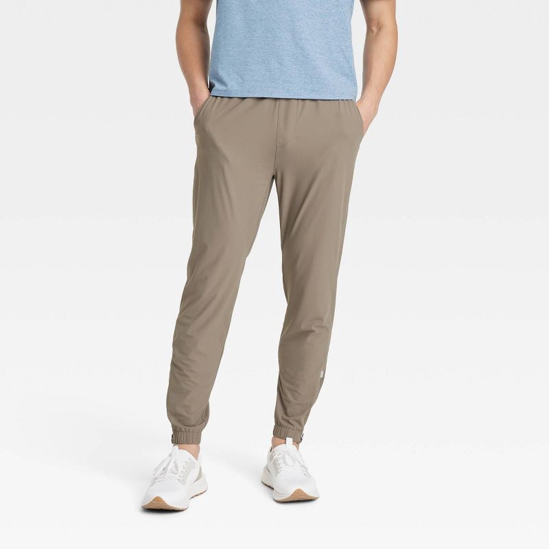 slide 1 of 3, Men's Lightweight Tricot Jogger Pants - All In Motion™ Taupe S: Mid Rise, Zippered Pocket, 1 ct