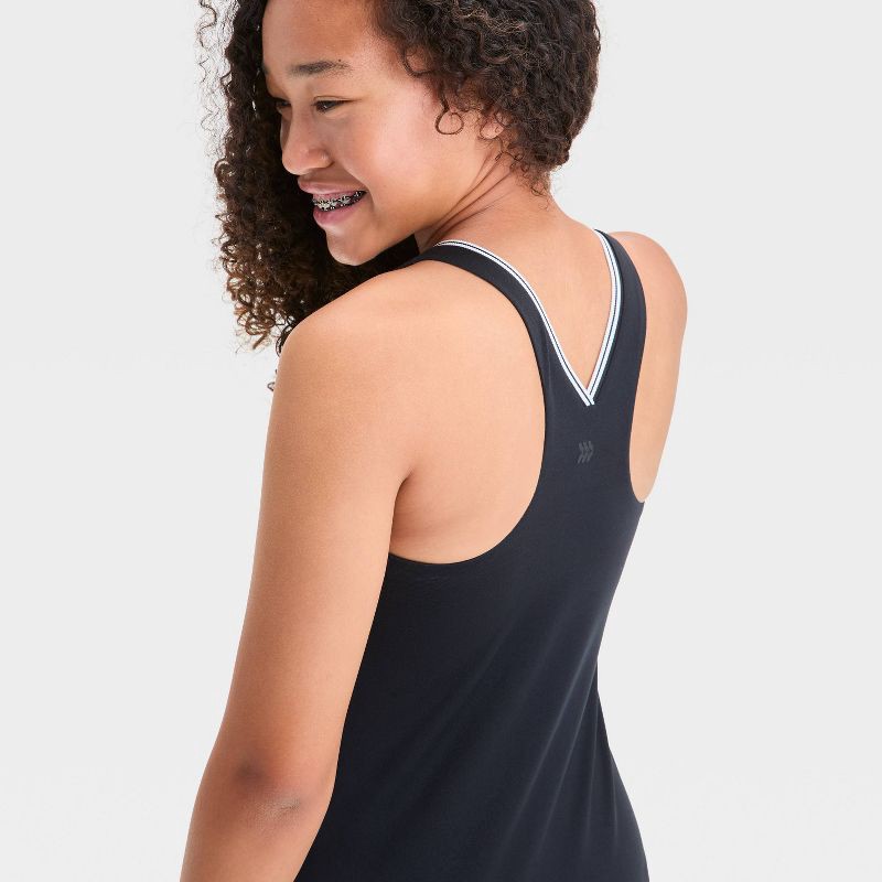 slide 3 of 3, Girls' Contrast Trim Active Dress - All In Motion™ Black L: Recycled Polyester, V Neck, Stash Pocket, 1 ct