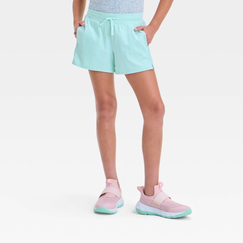 slide 1 of 3, Girls' Soft Stretch Shorts - All In Motion™ Light Teal Green L: Midweight, Moisture Wicking, Quick Drying, 1 ct