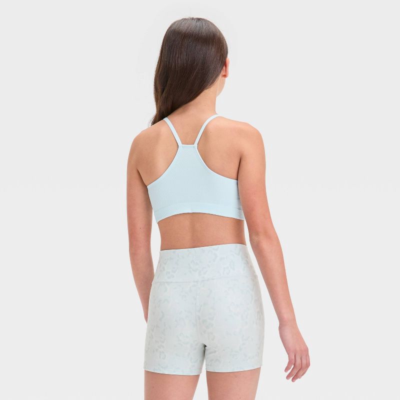 slide 2 of 3, Girls' Seamless Sports Bra - All In Motion™ Light Blue M: Racerback, Pullover, Nylon-Spandex Blend, Machine Washable, 1 ct