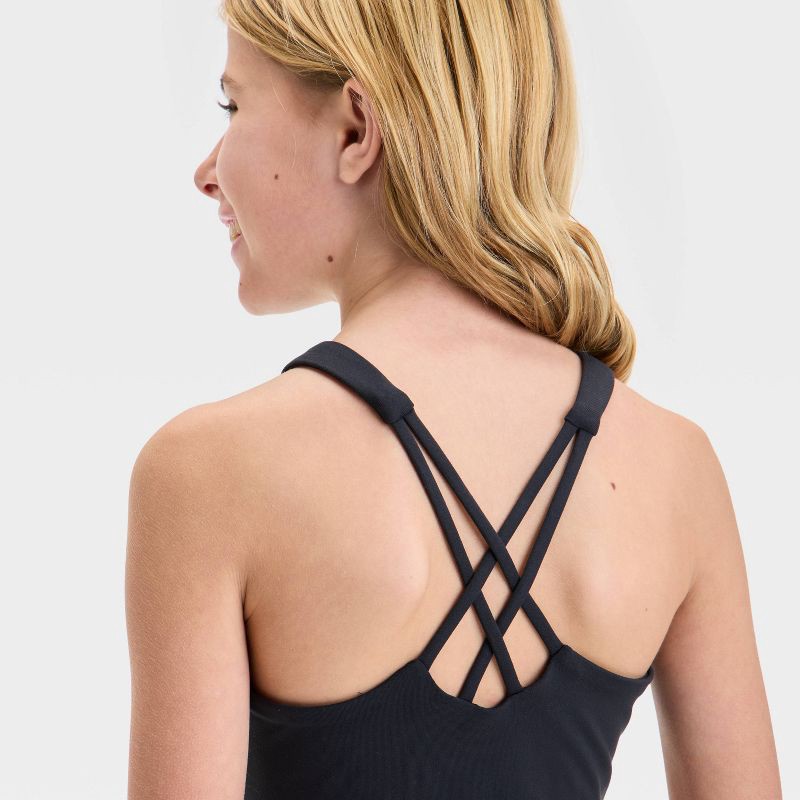 slide 3 of 3, Girls' Strappy Sports Bra - All In Motion™ Black M: Recycled Polyester, Spandex, Lattice Back, Moisture Wicking, Medium, 1 ct