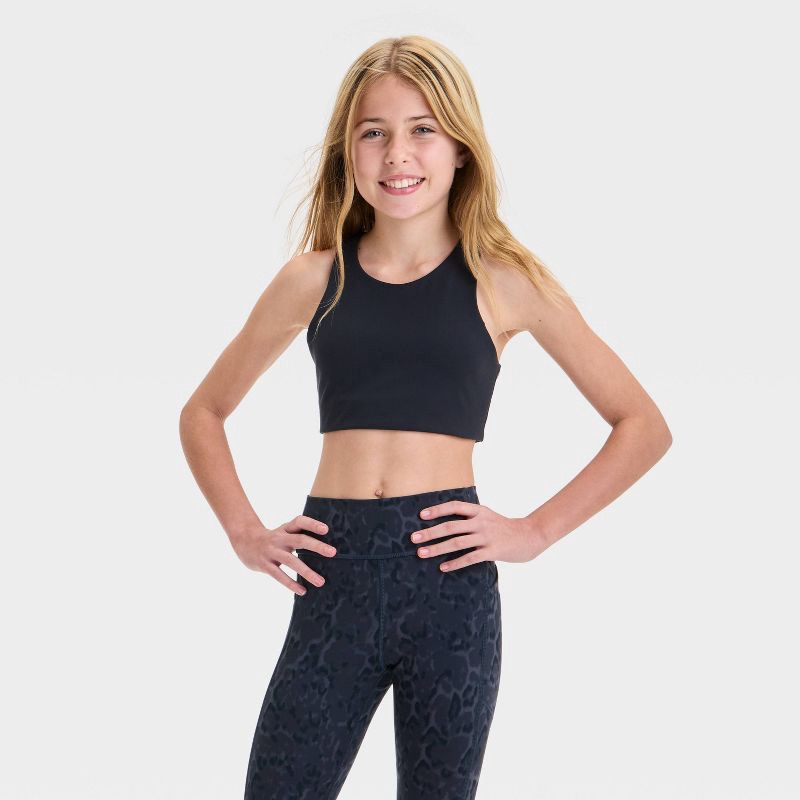 slide 1 of 3, Girls' Strappy Sports Bra - All In Motion™ Black L: Moisture Wicking, Lattice Back, Flat Seams, Pullover, 1 ct