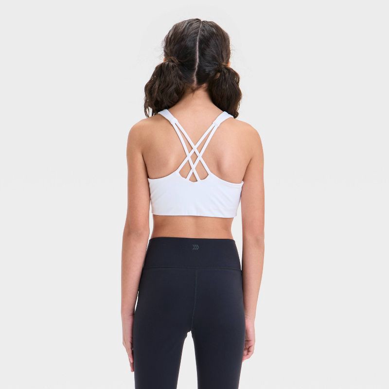 slide 2 of 3, Girls' Strappy Sports Bra - All In Motion™ White M: Recycled Polyester, Moisture Wicking, Lattice Back, 1 ct
