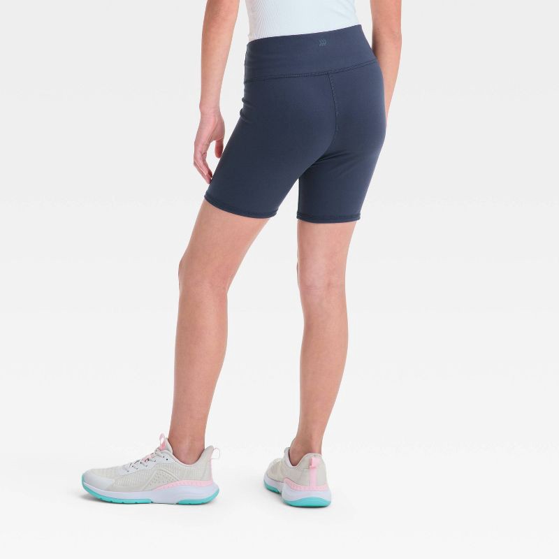slide 2 of 3, Girls' Bike Shorts - All In Motion™ Navy Blue M: Recycled Polyester, Spandex, Moisture Wicking, Quick Dry, High Rise, 1 ct