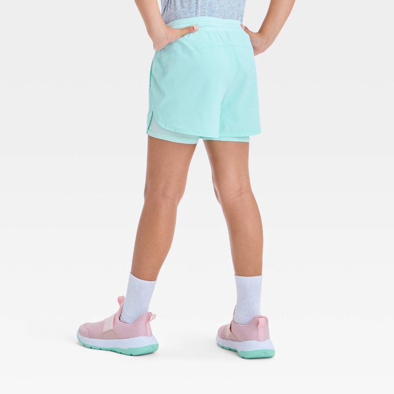 slide 2 of 3, Girls' Active Light 2-In-1 Run Shorts - All In Motion™ Light Teal Green M: Recycled Polyester, Spandex, Stash Pocket, 1 ct