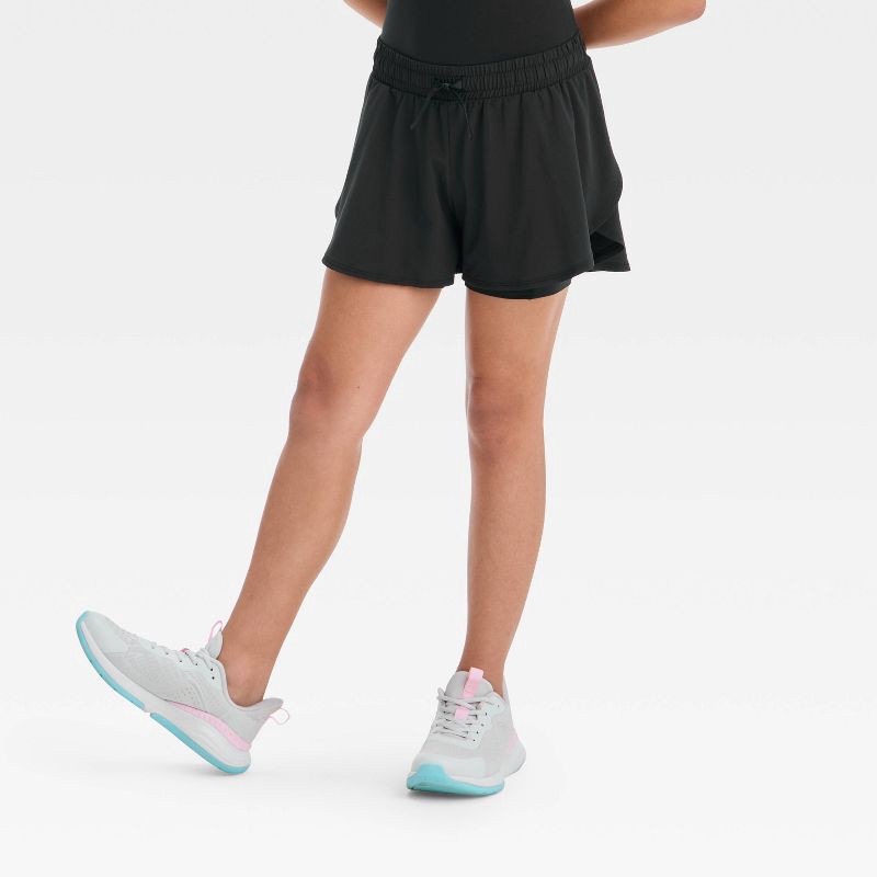 slide 1 of 3, Girls' Flowy Shorts - All In Motion™ Black M: Recycled Polyester, Spandex, Adjustable Waistband, 1 ct