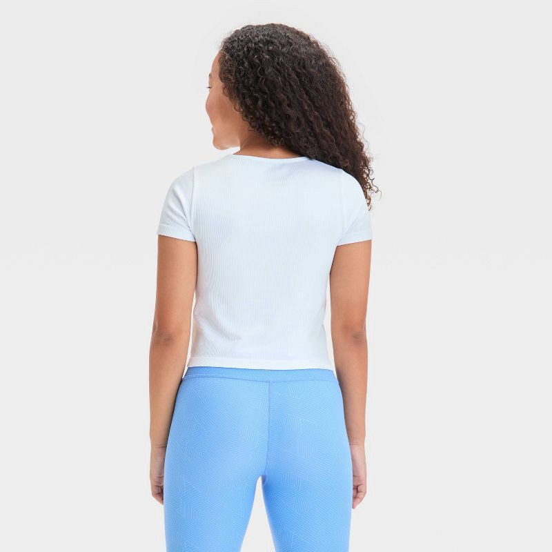 slide 2 of 3, Girls' Seamless Crop T-Shirt - All In Motion™ White L: Fitted Knit Pullover, Short Sleeve, 1 ct